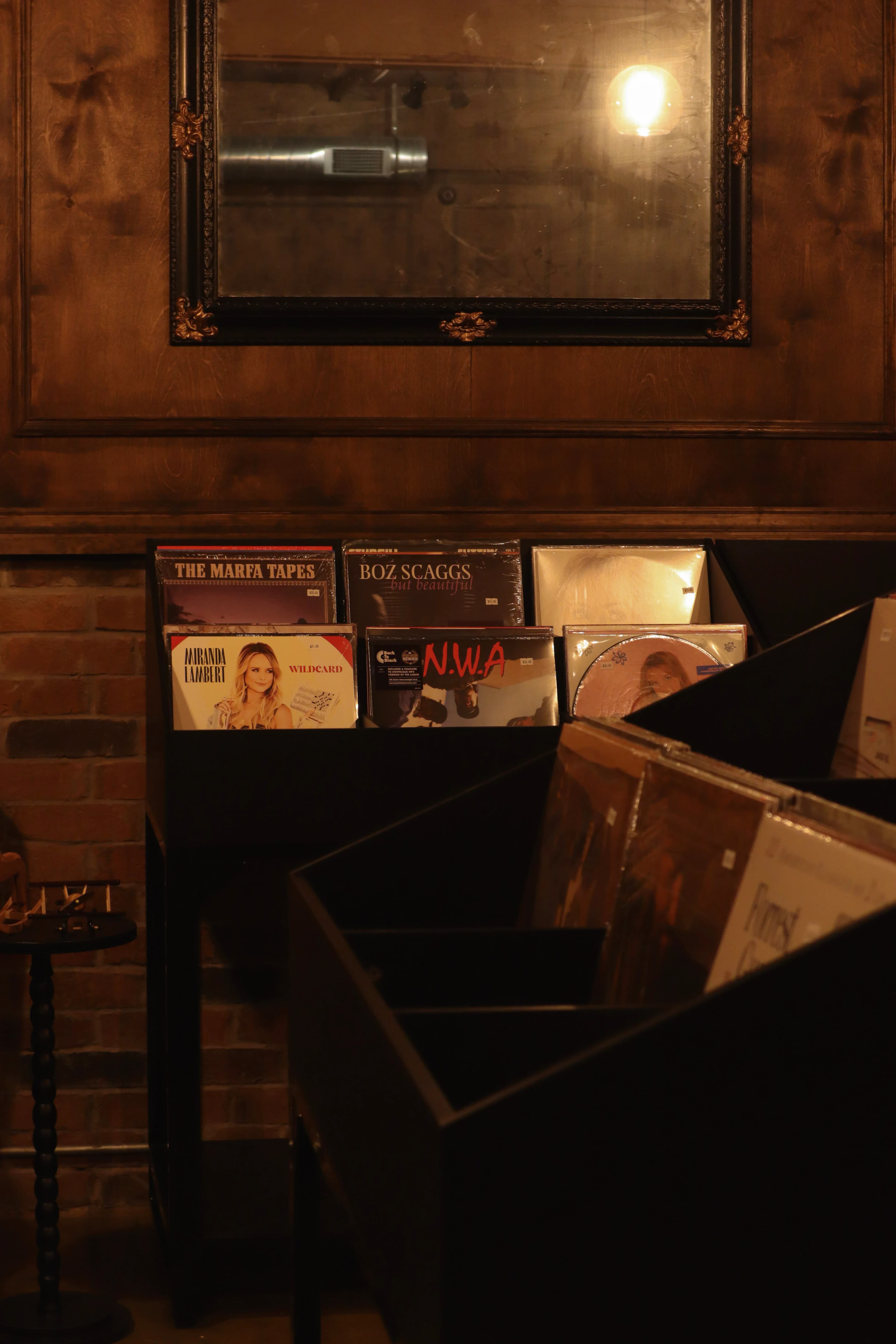 Browsing vinyl records next to coffee