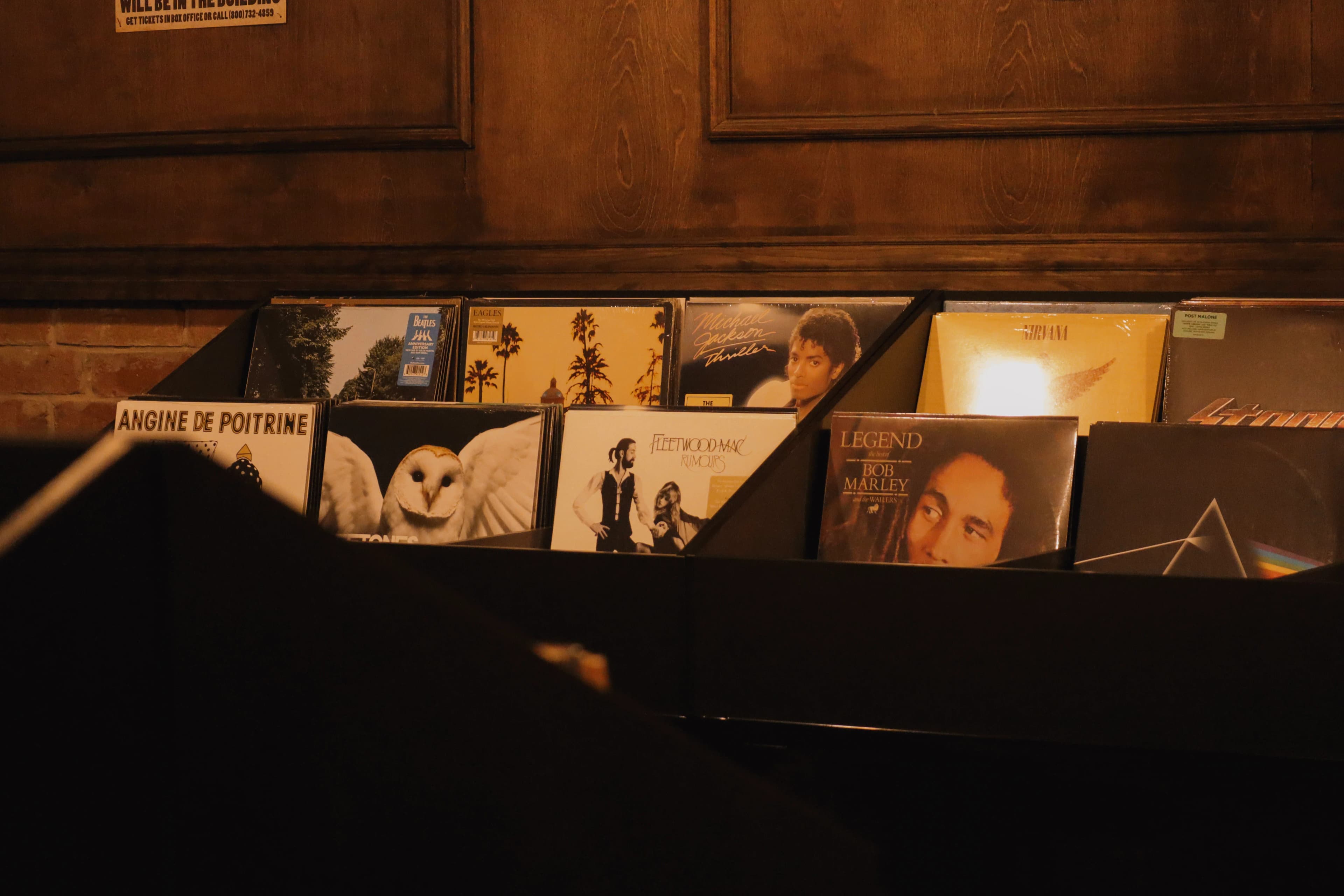 Vinyl records in wooden crates at Rhythm & Brew