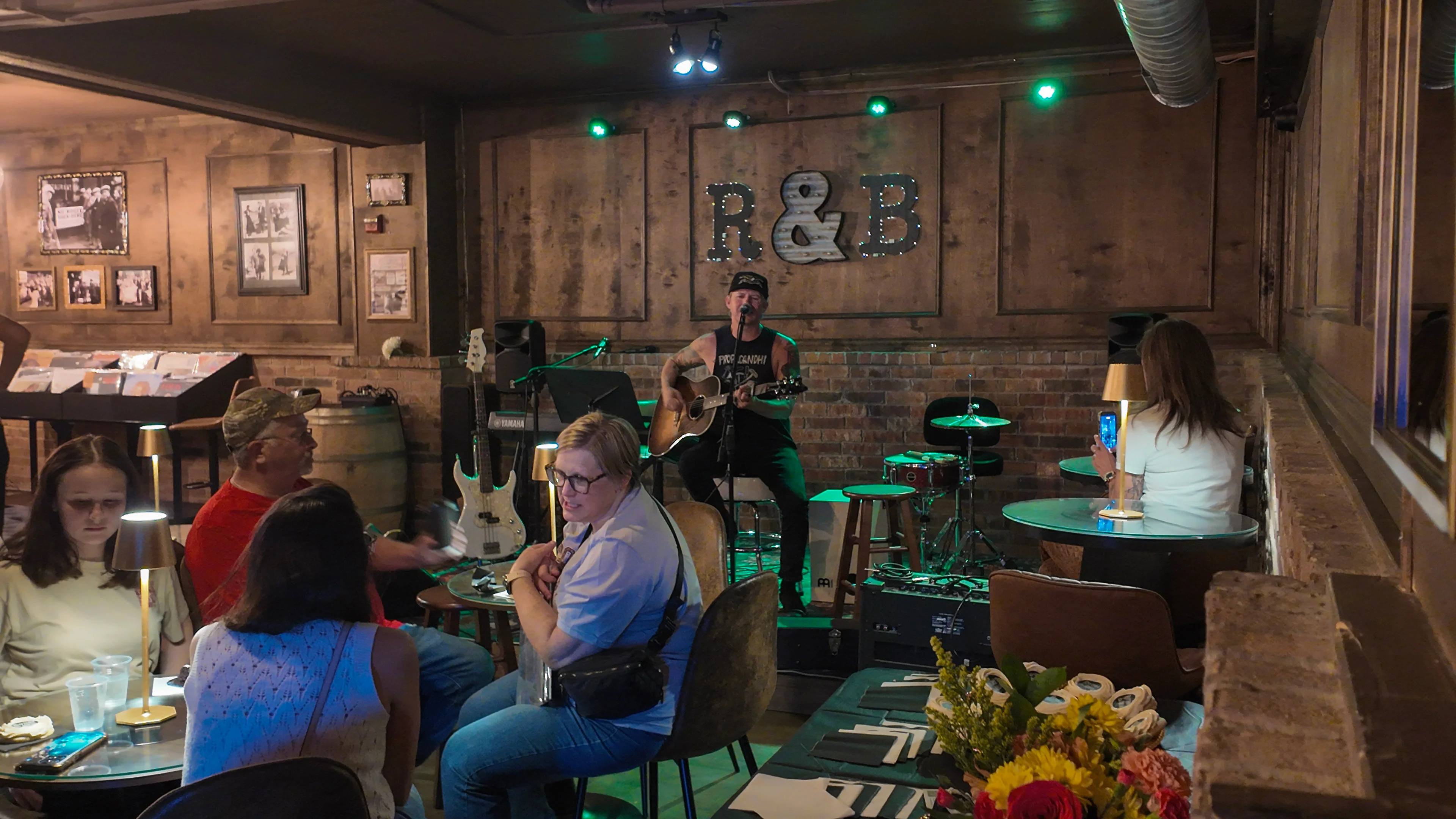 Guests watching live music on opening night at Rhythm & Brew